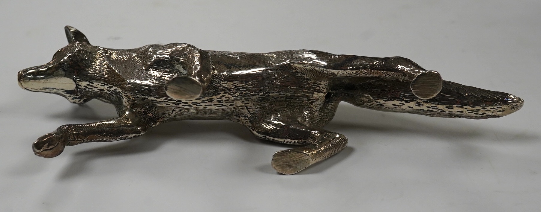 An Elizabeth II silver free standing model of a fox, C.J. Vander Ltd, Birmingham, 1965, length 15.8cm, 7oz. Condition - good